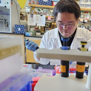 Former Dinglasan team member doing laboratory work