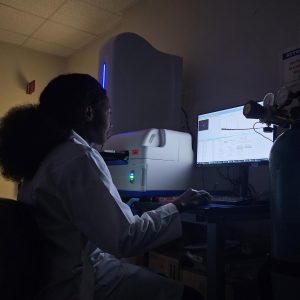 Francine B. Sado Yousseu, PhD, operating the user results interface of the MassARRAY System by Agena Bioscience